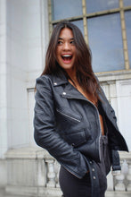 Load image into Gallery viewer, Black pebbled leather biker jacket, side view