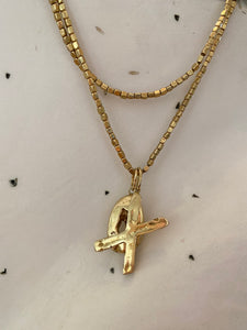 Brass cube chain with 'x' and 'o' initial charms