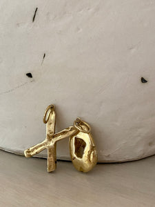 'x' and 'o' brass initial charm